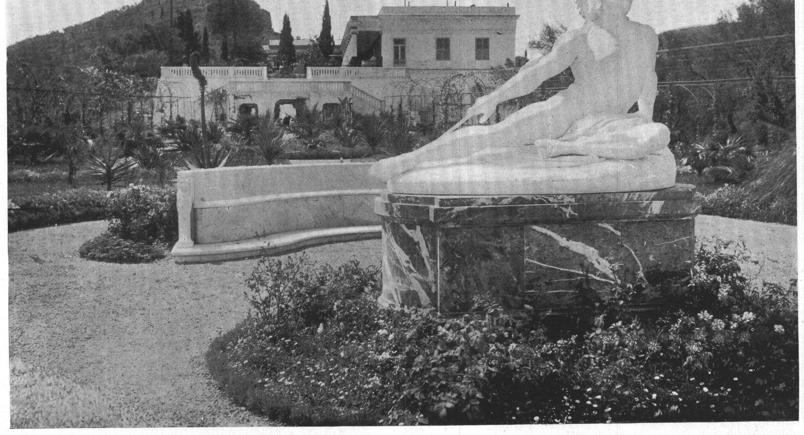 "The Dying Achilles." In the distance is the stairway to the Second Terrace, now overhung with vines; under it is The Grotto
